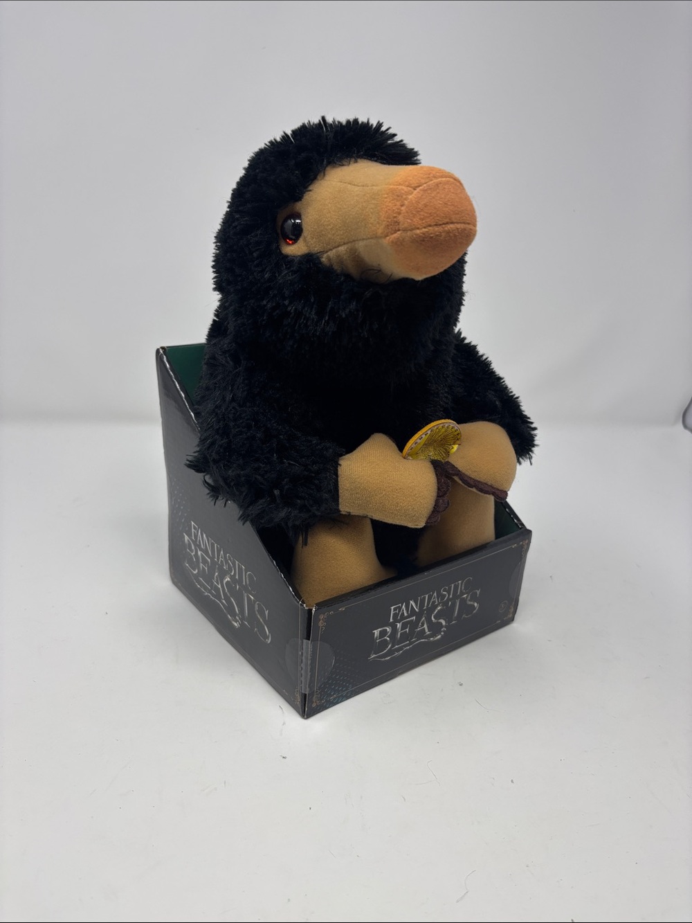 Warner Bros. Fantastic Beasts Niffler Plush - Black and Tan with Gold Coin